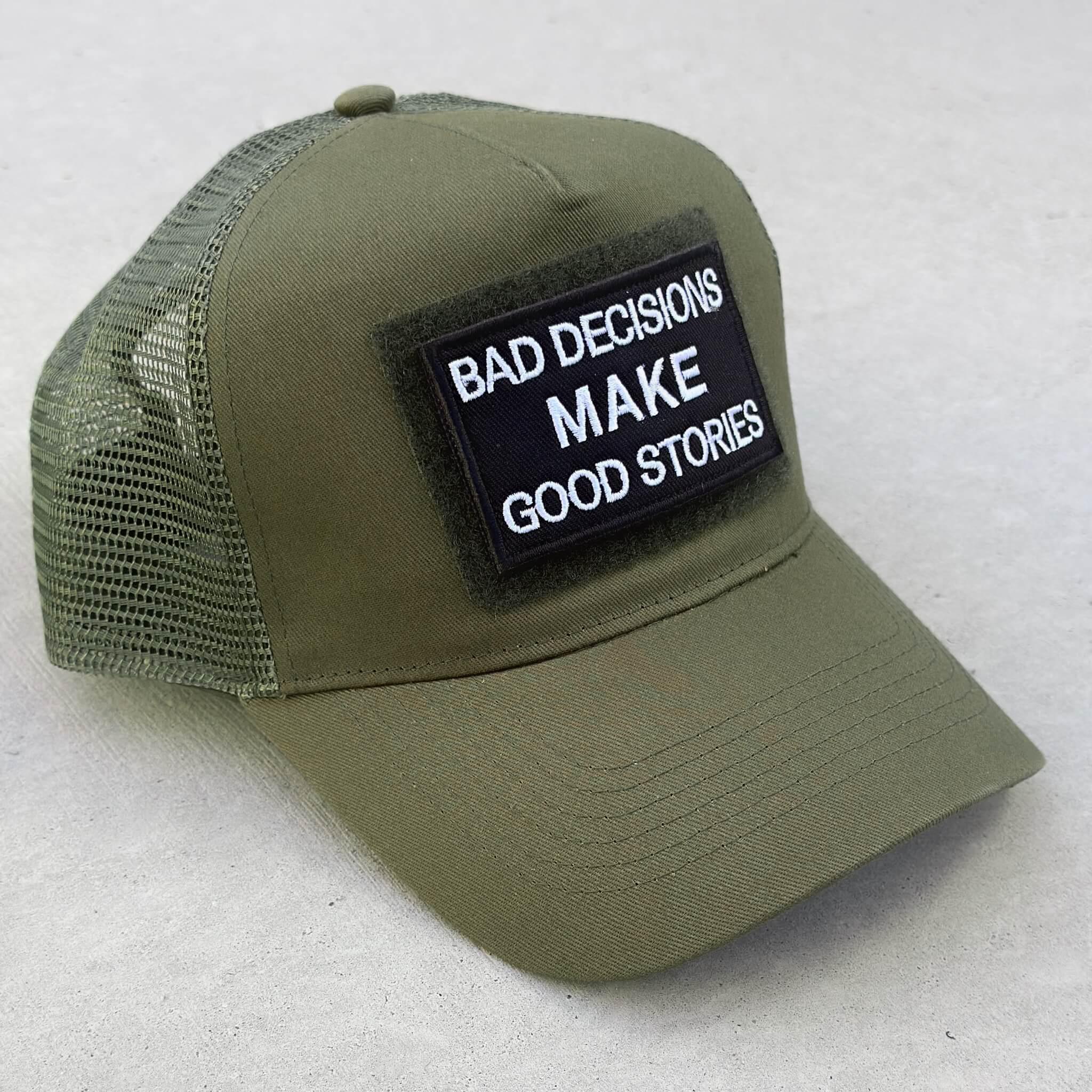 Trucker snapback cap in military green with Bad Decision Makes Good Stories patch