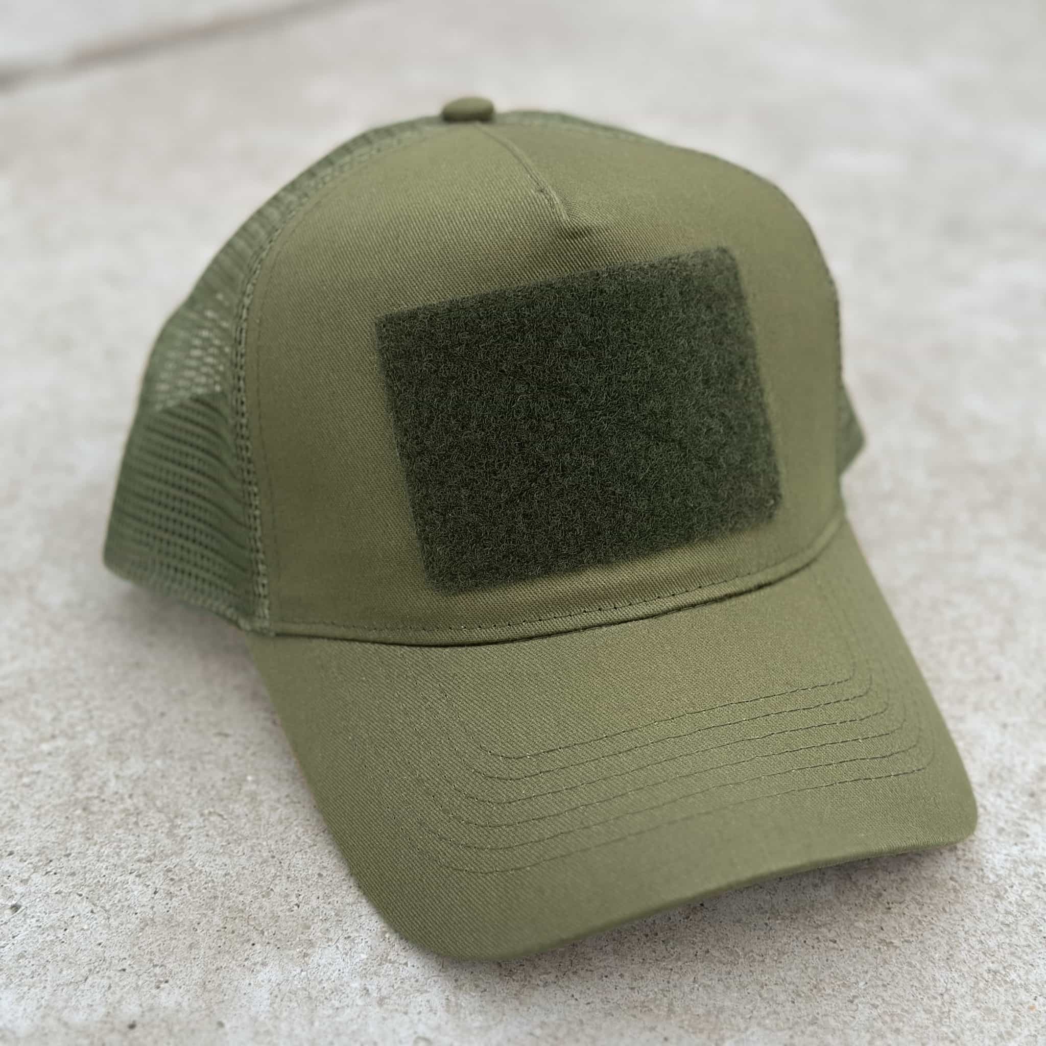 The Blank Canvas Snapback Cap in military green color with large hook-and-loop area on the front